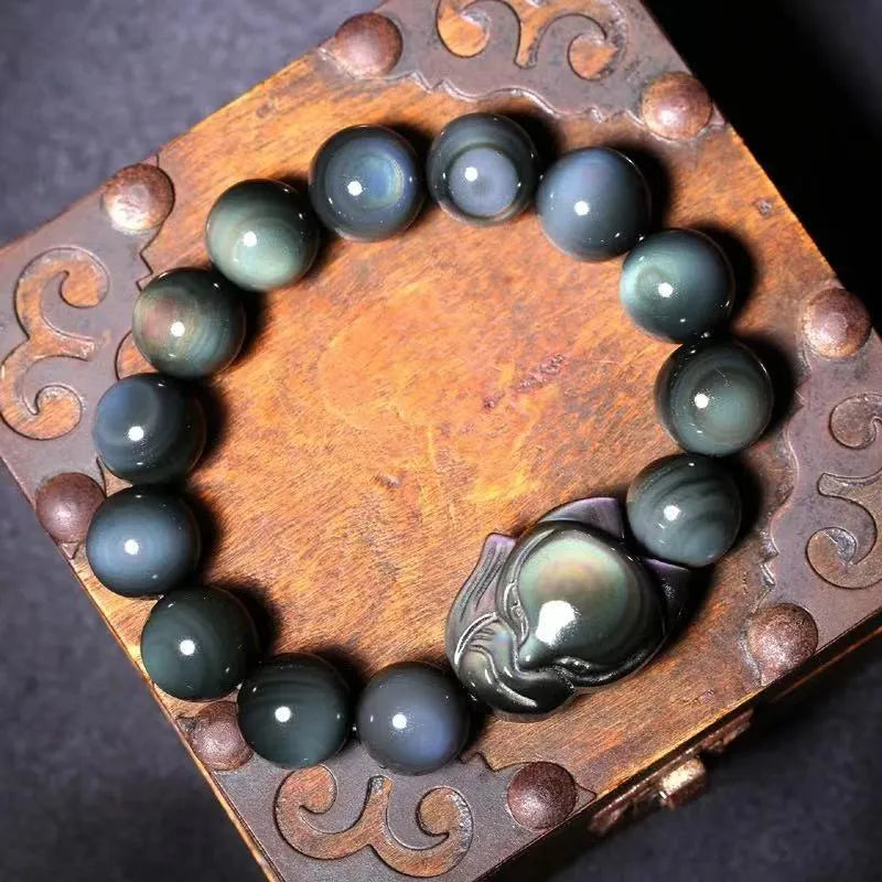 Obsidian fox carved couple bracelet showing animal detail and bead sizing options