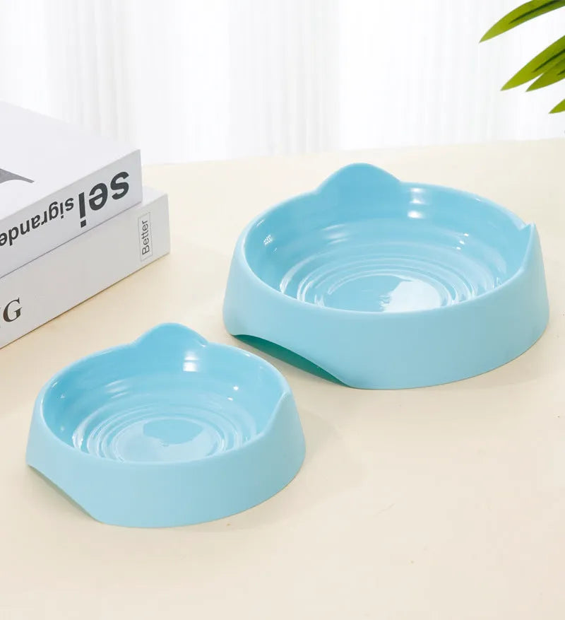 Blue ceramic dog slow feeder bowl with puzzle maze design for portion control