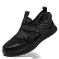 Men's grey anti-smash and anti-puncture insulation safety work shoe with a woven upper and rubber sole.