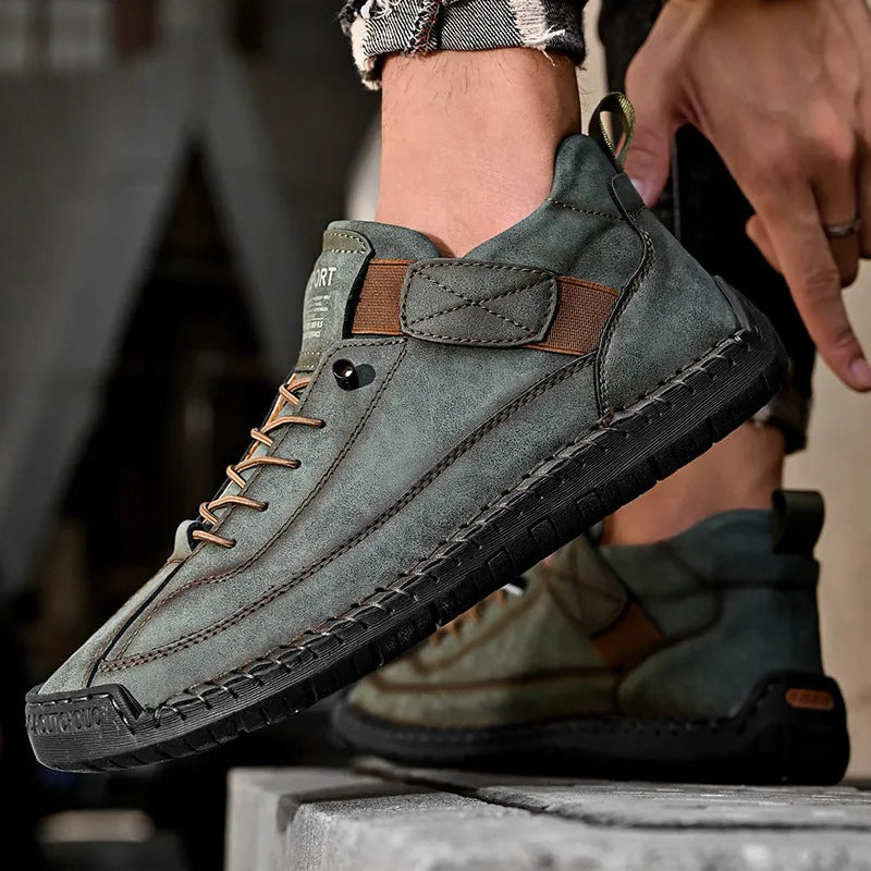 Men's round-toe mid-calf casual boot in black with visible tooling stitching detail on the microfiber upper.