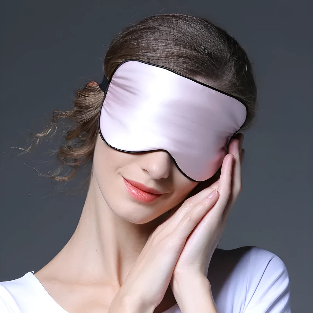 Double-sided mulberry silk eye mask with embroidered print in a selection of colours.