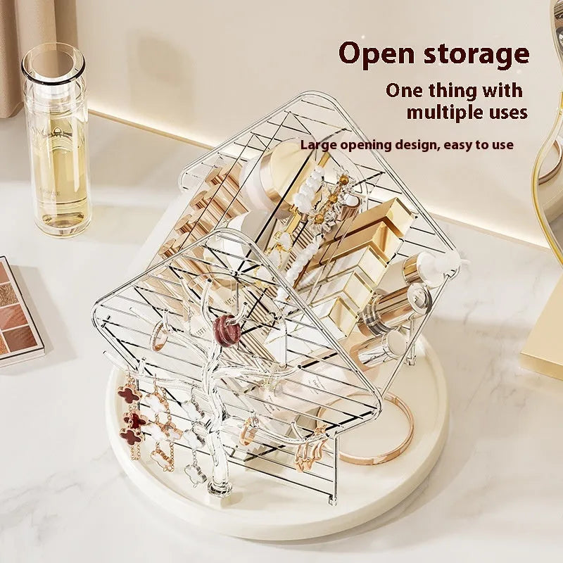 A clear and an amber gold rotating plastic cosmetics storage box on a dressing table.