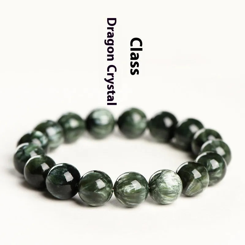 Green Dragon Crystal bracelet with round beads featuring Ruyi design elements.