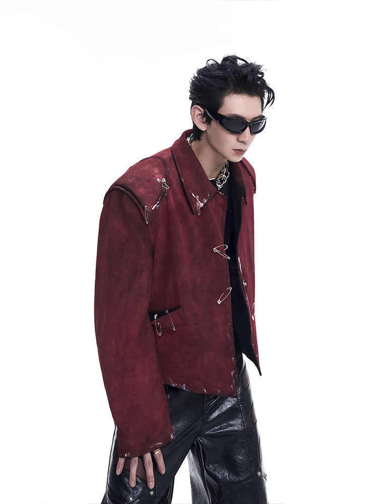 Men's red quilted jacket with decorative flocking pins and lapel collar in loose fit