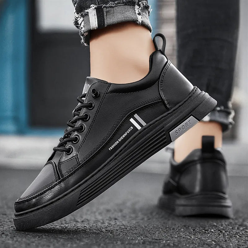Men's low-top white skate shoes with elastic band fastening and a round toe, shown on a plain background.