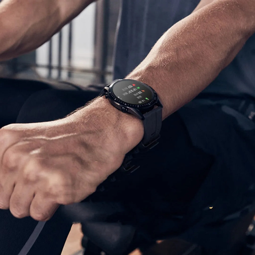 Round aluminium alloy smartwatch with Bluetooth calling and heart rate monitoring on wrist.
