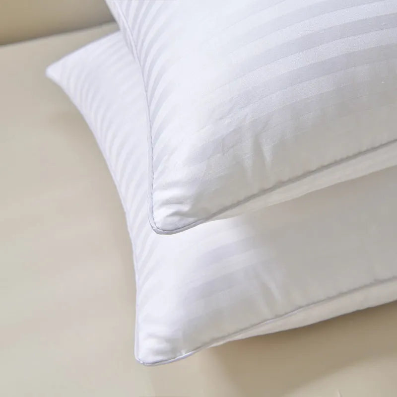 White cotton satin stripe pillow with feather and cotton filling in three loft weight options