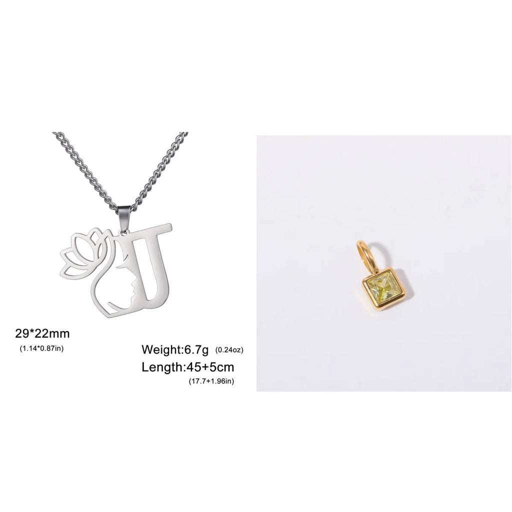 Stainless steel letter necklace with cross chain and gold electroplated pendant.