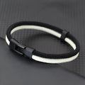 Black and white woven hand strap made from Milan rope alloy showing textured pattern