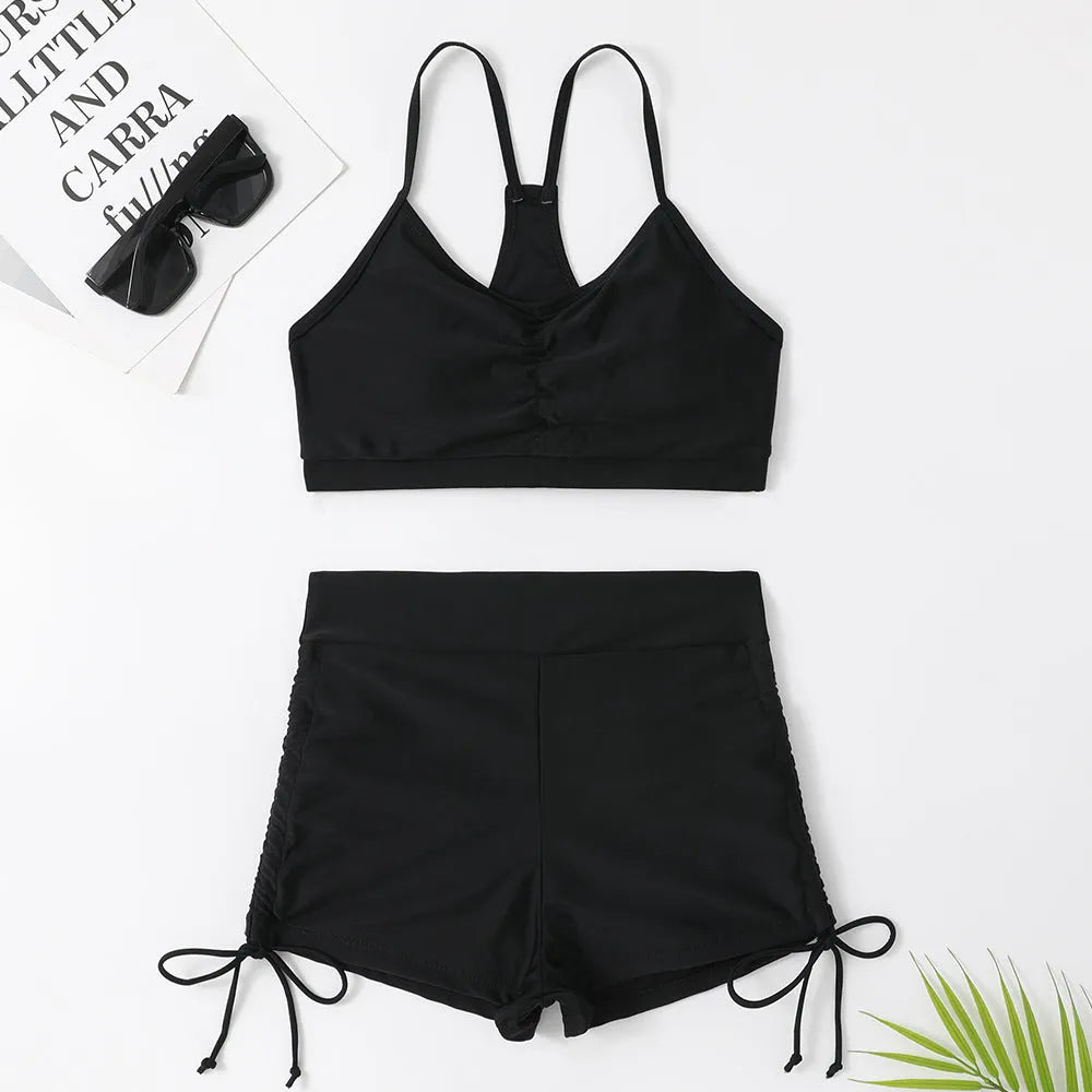 Women's high waisted split leg bikini swimsuit in black or purple colours