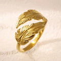 Women's adjustable stainless steel feather ring in gold and silver colour options